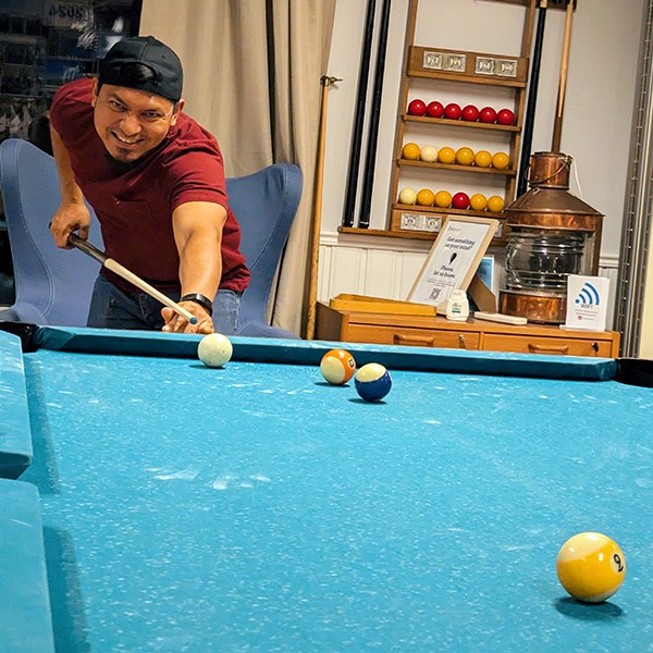 A man playing pool