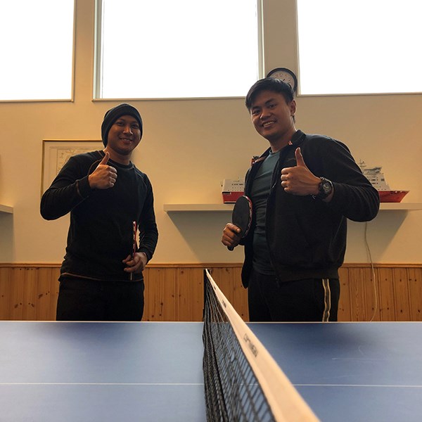 Two guests at the table tennis table